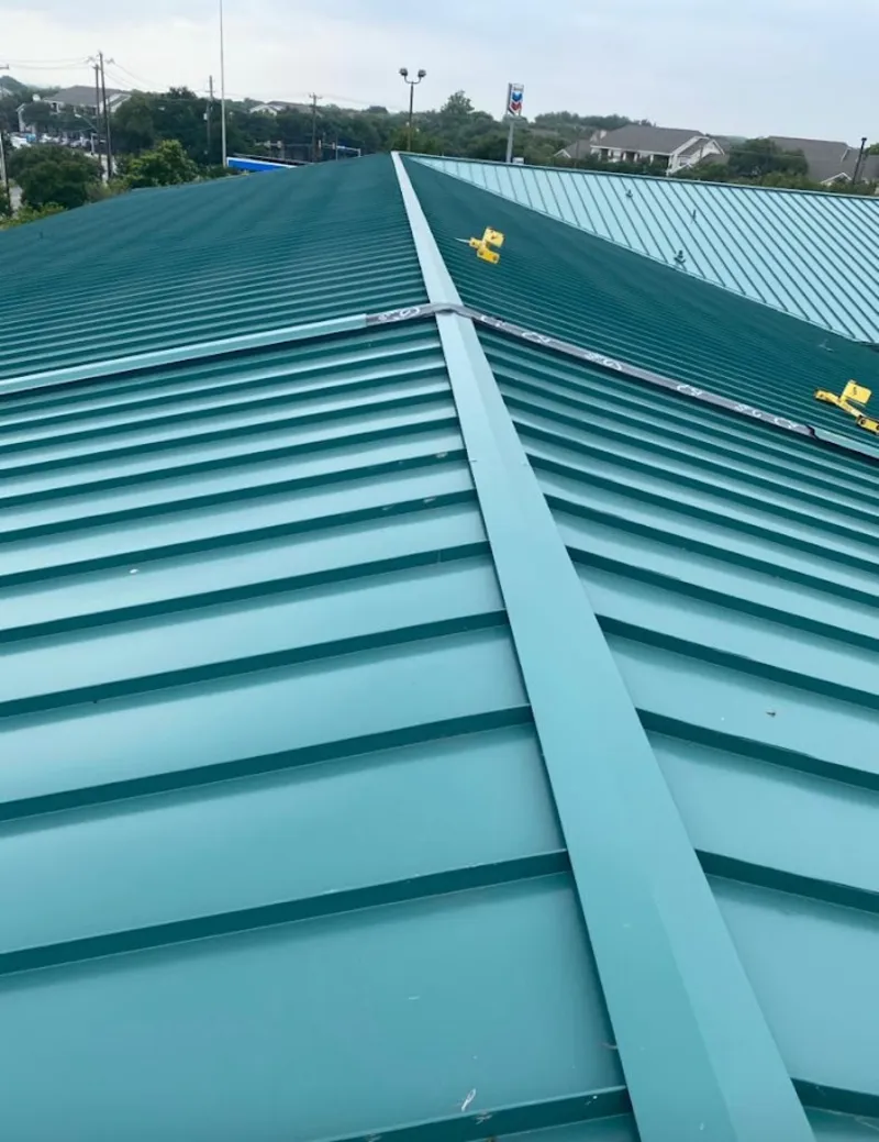 Green commercial metal roof ridge and valley for Metal Roof Repair in North Vernon